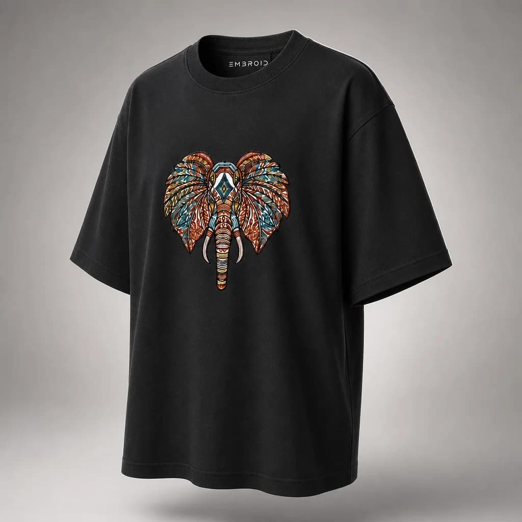Elephant embroidered oversized t-shirt in black, studio shot