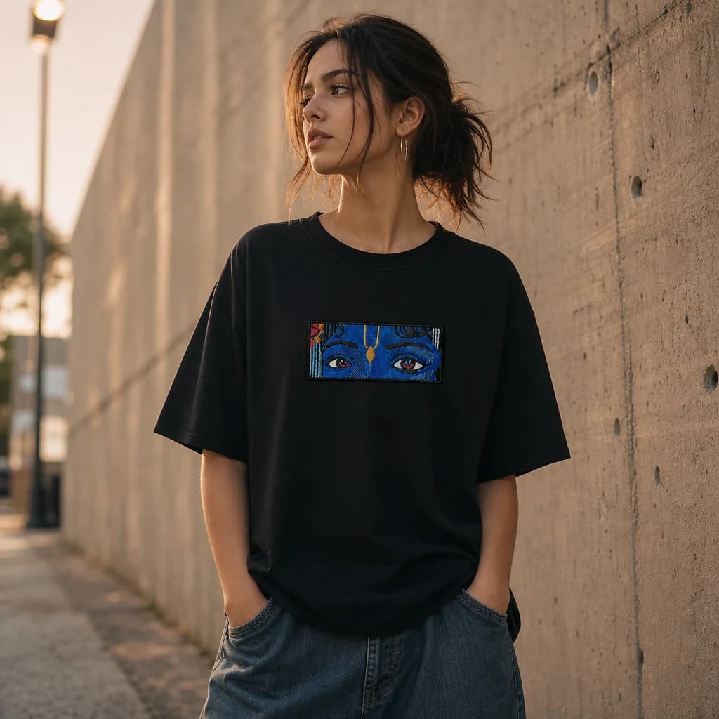 Outdoor street shot of an embroidered oversized tee